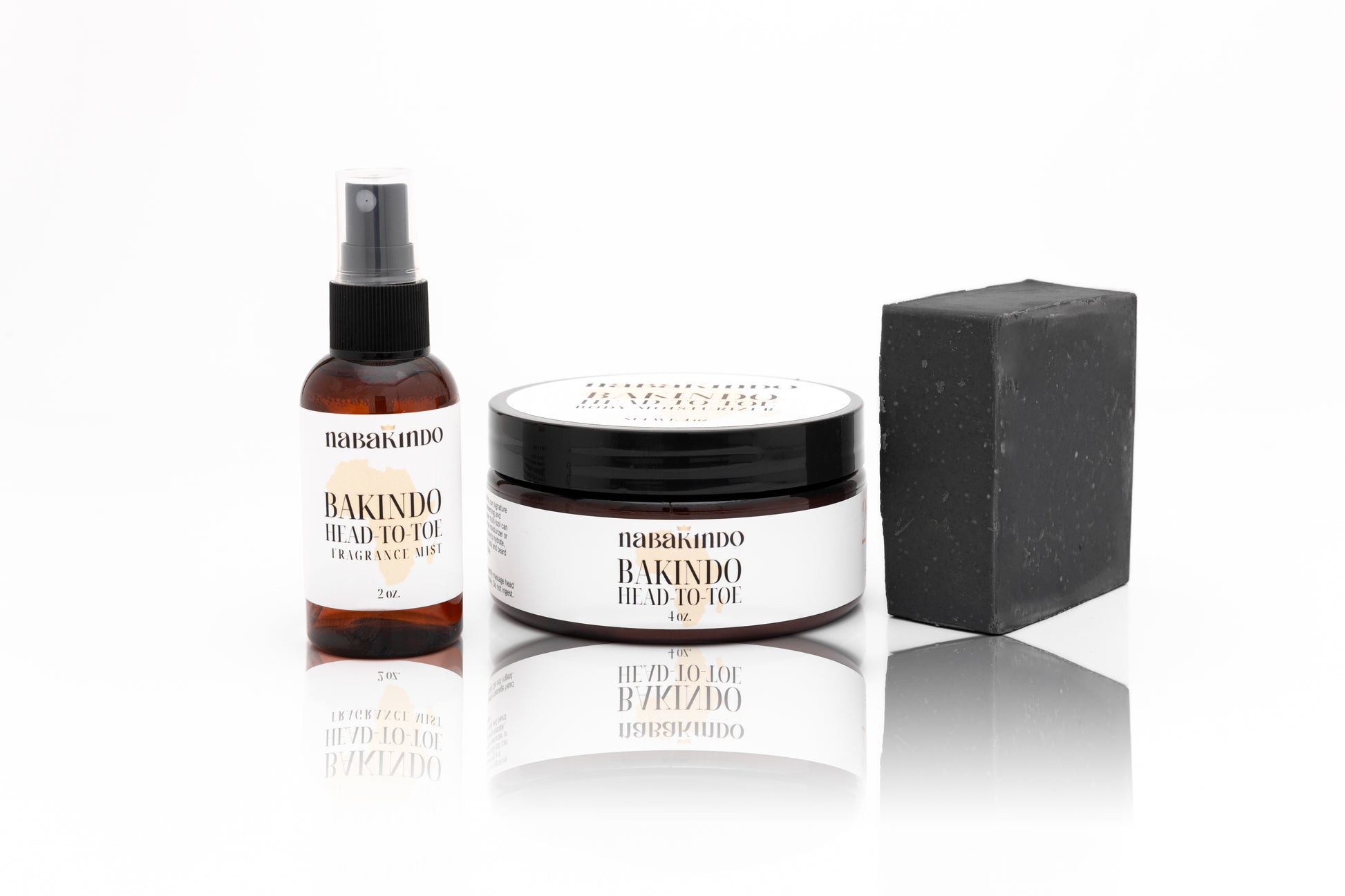 Bakindo Product Bundle which indludes: Bakindo Head to Toe Body Moisturizer, Bakindo Head to Toe Body Spray, and the Carbon Clean Vegan Bar.