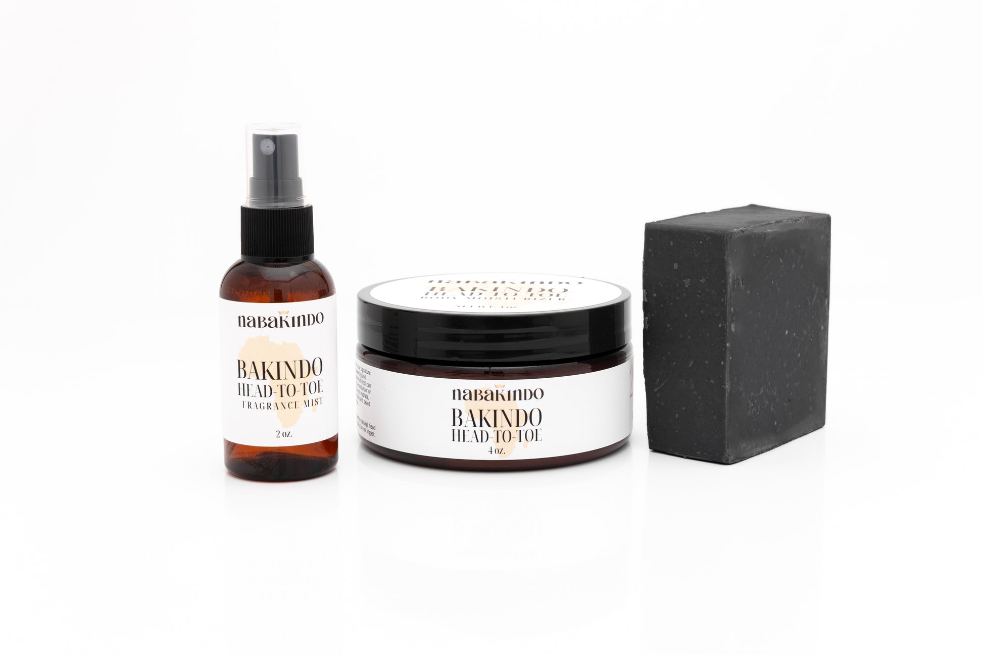 Bakindo Product Bundle which indludes: Bakindo Head to Toe Body Moisturizer, Bakindo Head to Toe Body Spray, and the Carbon Clean Vegan Bar.