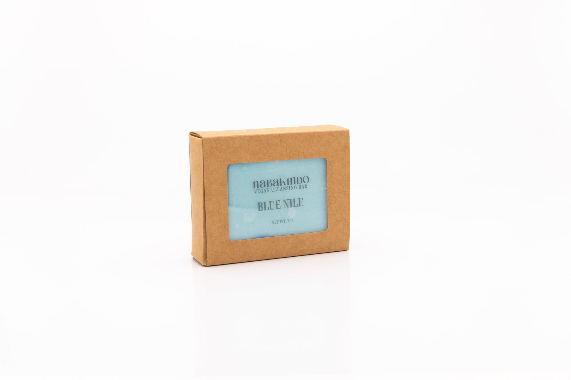 Photo of a vegan, facial and body cleansing bar shown in sustainable packaging.