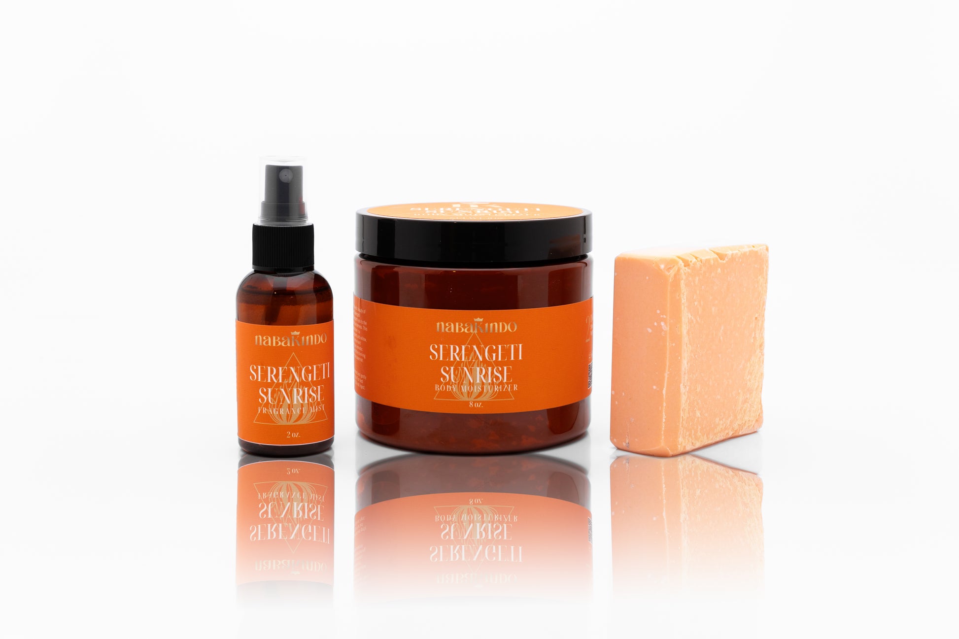 A photo of the serengeti sunrise bundle which includes the fragrance mist, a body butter, and the vegan cleansing bar.