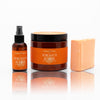 A photo of the serengeti sunrise bundle which includes the fragrance mist, a body butter, and the vegan cleansing bar.