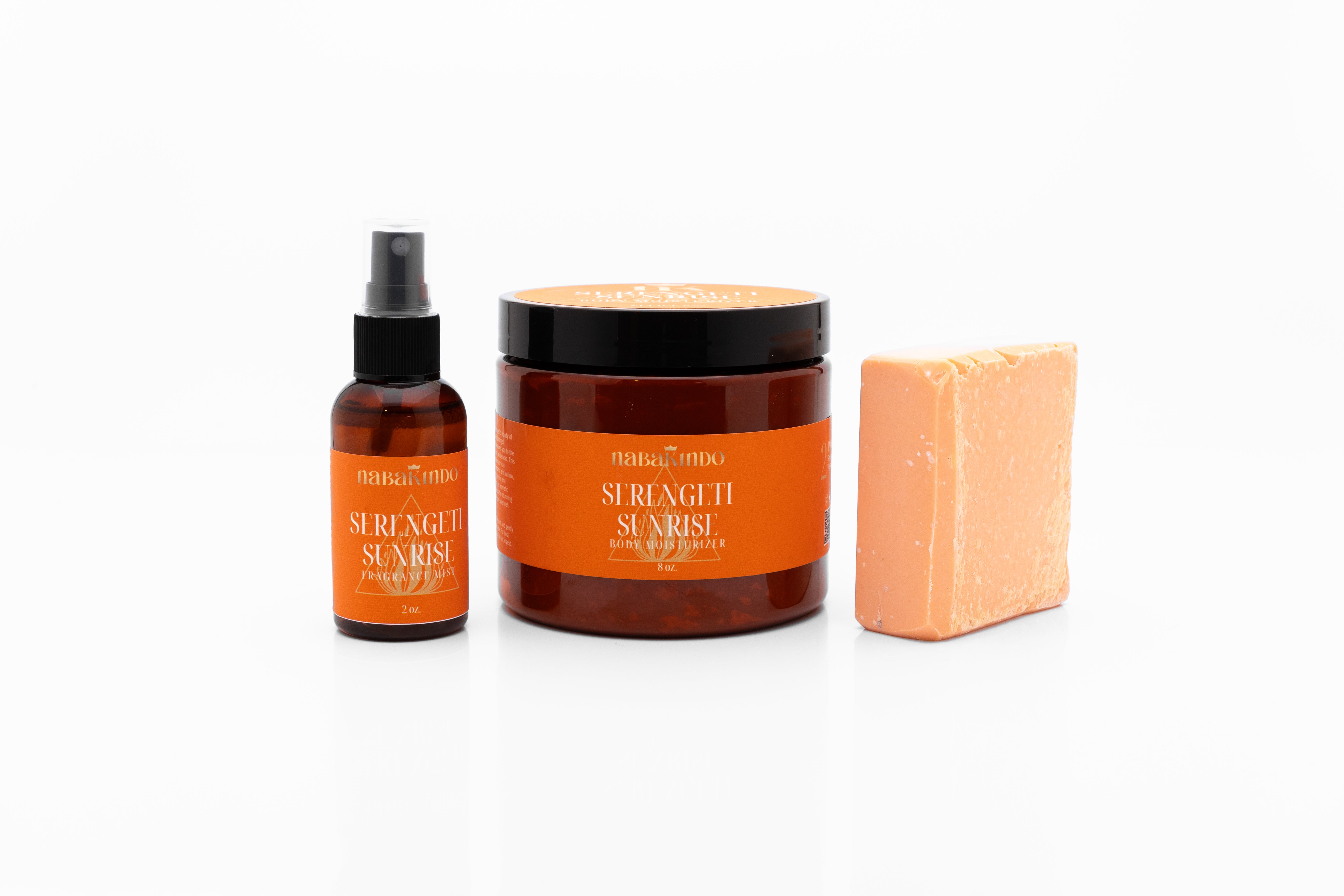 A photo of the serengeti sunrise bundle which includes the fragrance mist, a body butter, and the vegan cleansing bar.