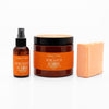 A photo of the serengeti sunrise bundle which includes the fragrance mist, a body butter, and the vegan cleansing bar.